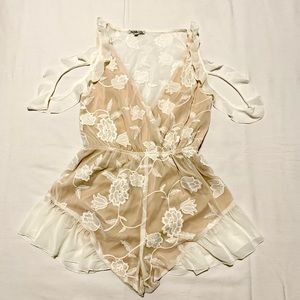 Cream Romper with White and Floral Details